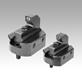 Fixed stop with grip insert for draw-down clamping system
