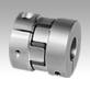 Elastomer dog couplings with radial clamping hub